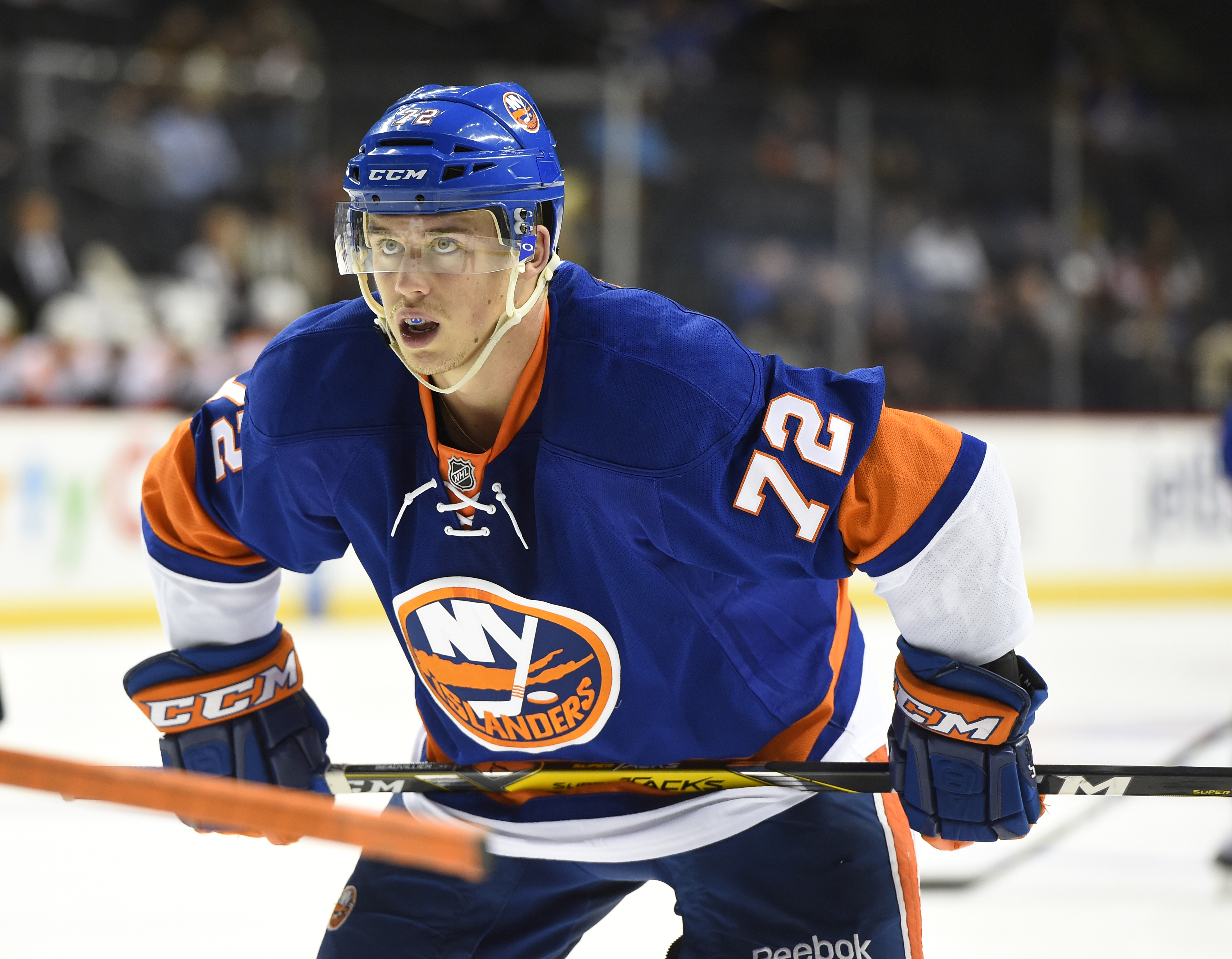 New York Islanders left wing Anthony Beauviller readies for a face off in the second period of a preseason NHL hockey game in New York., Monday, Sept. 26, 2016. (AP Photo/Kathy Kmonicek)