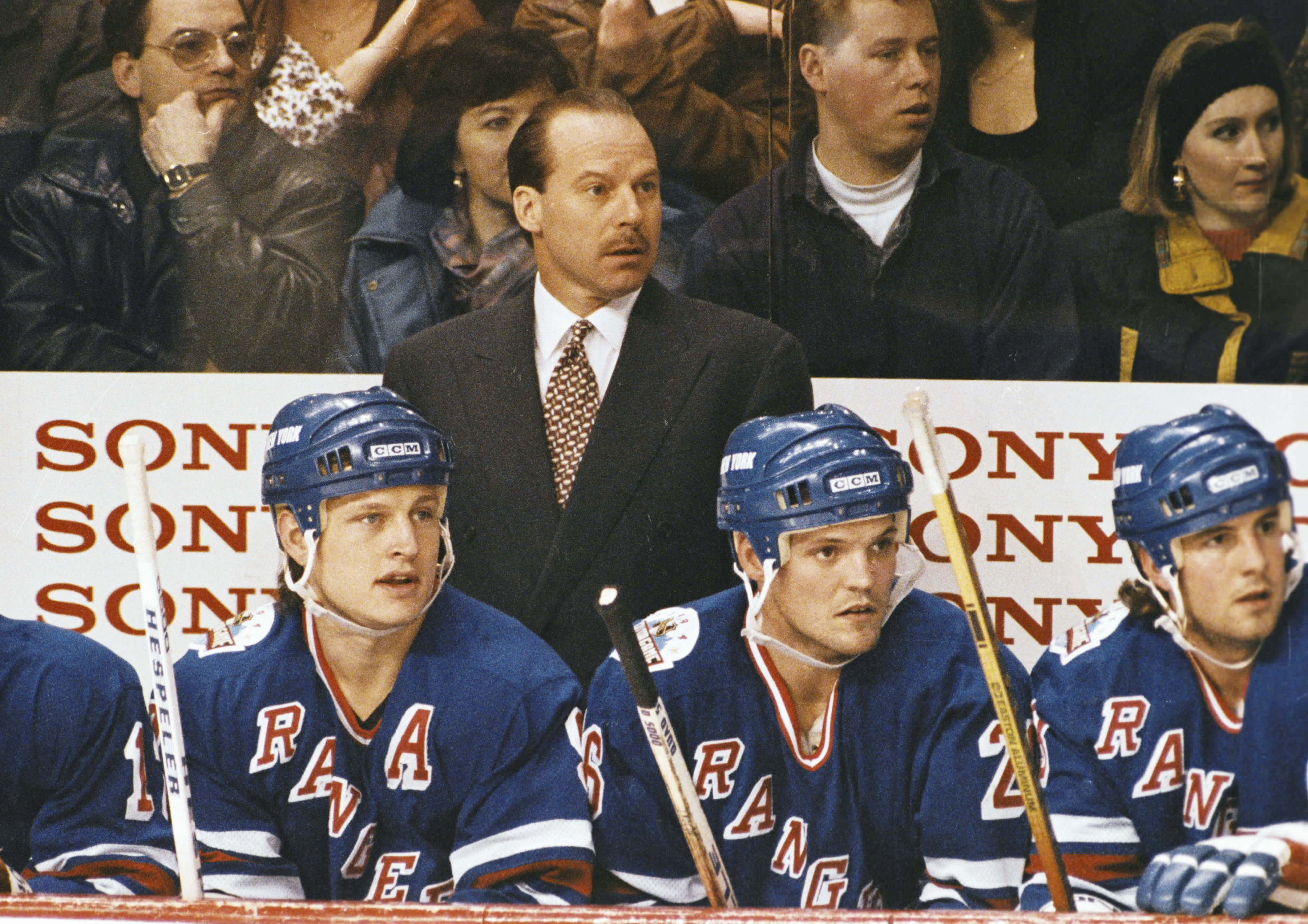 MONTREAL, CANADA - CIRCA 1993: Head Coach of the New York Rangers Mike Keenan follows the action from the bench at the Montreal Forum circa 1993 in Montreal, Quebec, Canada. (Photo by Denis Brodeur/NHLI via Getty Images)