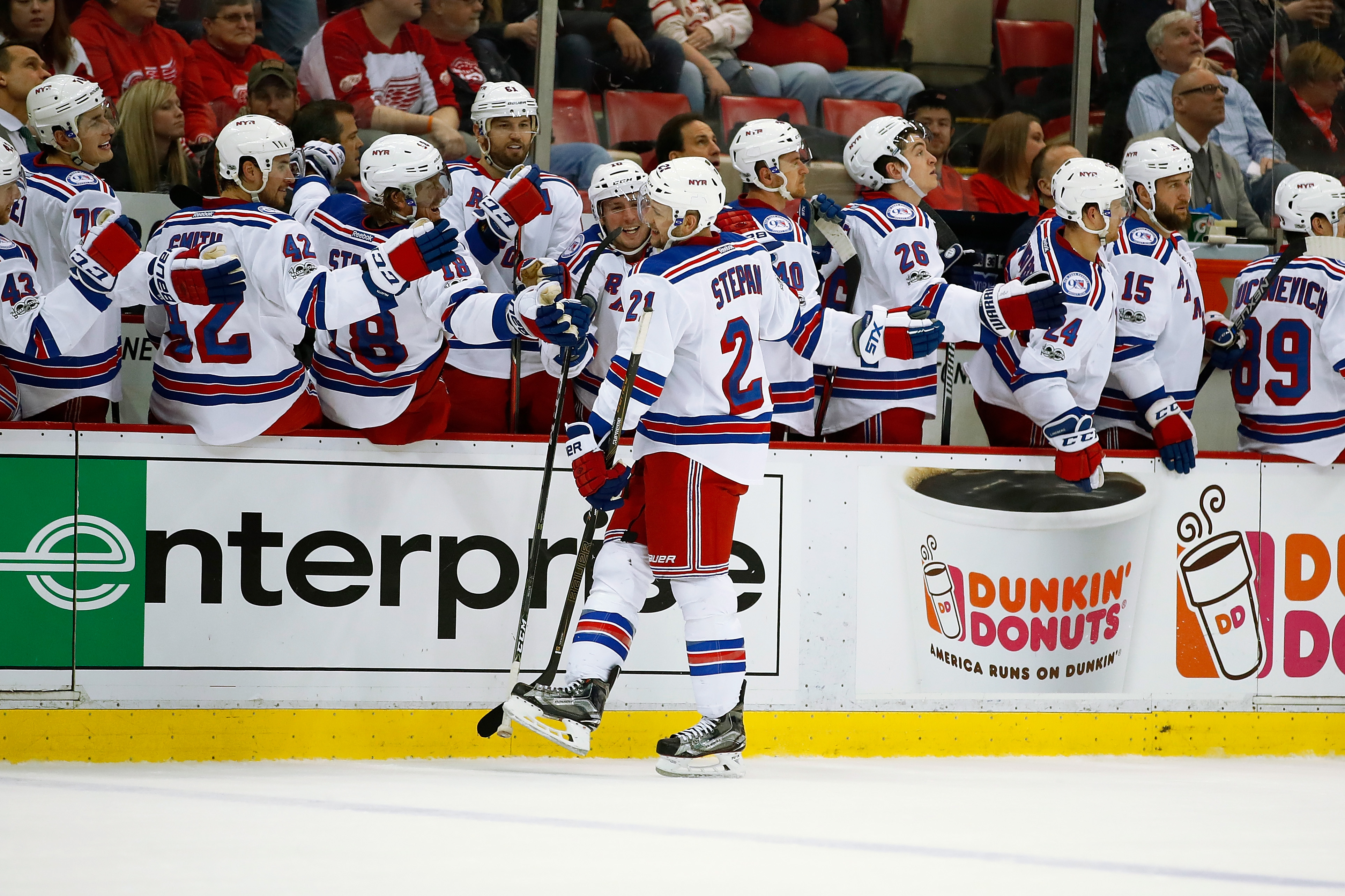 DETROIT, MI - MARCH 12: Derek Stepan #21 of the New York Rangers celebrates a third period power play goal with teammates while playing the Detroit Red Wings at Joe Louis Arena on March 12, 2017 in Detroit, Michigan. New York won the game 4-1. (Photo by Gregory Shamus/Getty Images)