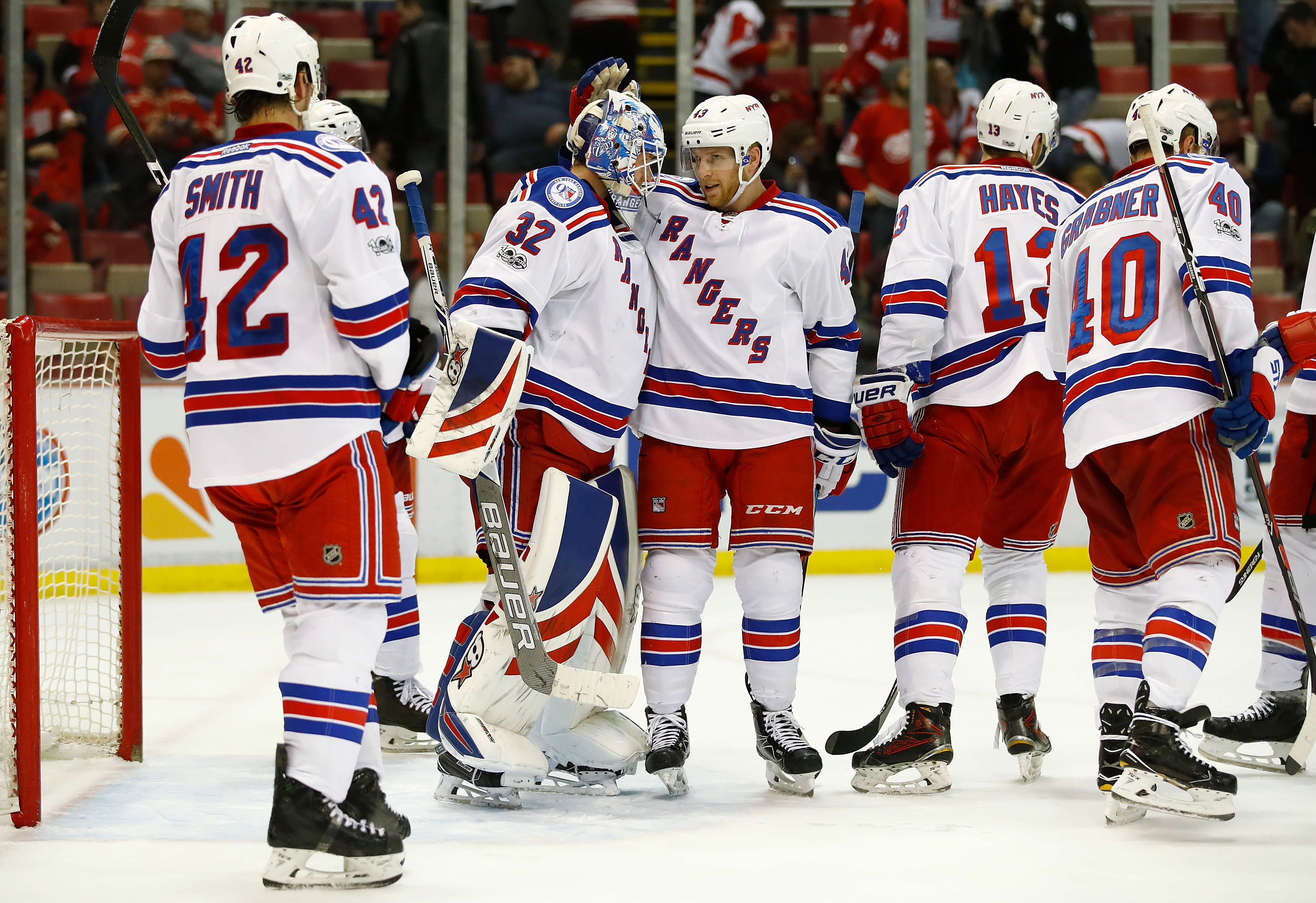 DETROIT, MI - MARCH 12: Antti Raanta #32 of the New York Rangers celebrate a 4-1 win over the Detroit Red Wings with Steven Kampfer #43 at Joe Louis Arena on March 12, 2017 in Detroit, Michigan. (Photo by Gregory Shamus/Getty Images)