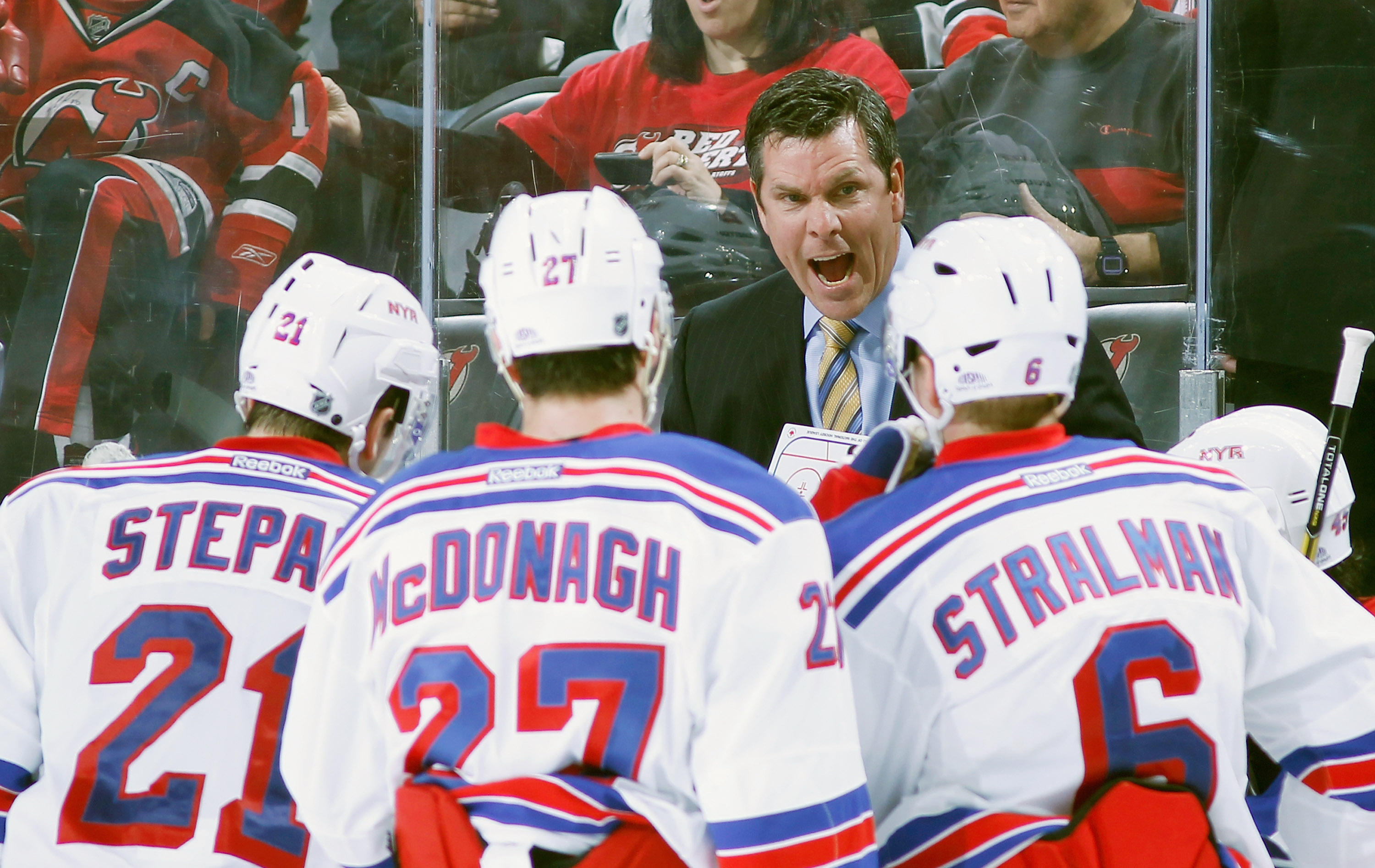 NEWARK, NJ - FEBRUARY 05: Assistant coach Mike Sullivan of the New York Rangers gives instructions against the New Jersey Devils during the game at the Prudential Center on February 5, 2013 in Newark, New Jersey. (Photo by Andy Marlin/NHLI via Getty Images)