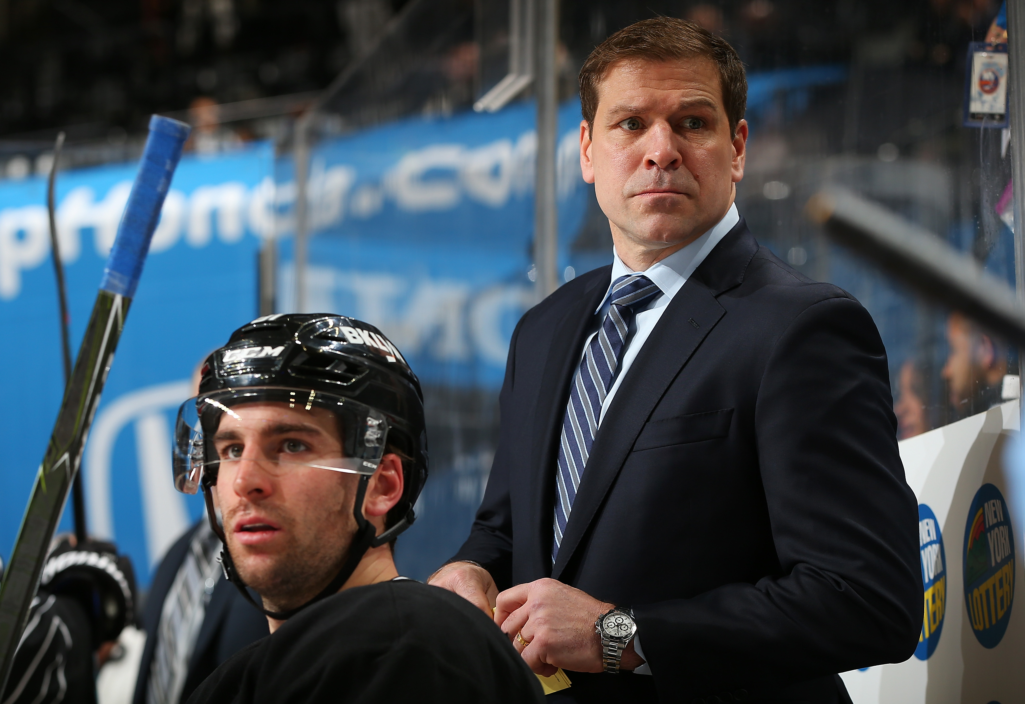 NEW YORK, NY - JANUARY 19: Doug Weight of the New York Islanders looks on from the bench during his first game as head coach against the Dallas Stars as John Tavares #91 waits to enter the game at the Barclays Center on January 19, 2017 in Brooklyn borough of New York City. (Photo by Mike Stobe/NHLI via Getty Images)